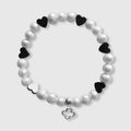 Bracelet en perles d'eau douce et hematite en coeur