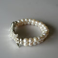 bracelet poisson articulé perles d'eau douce